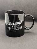 Strange and Unusual mug